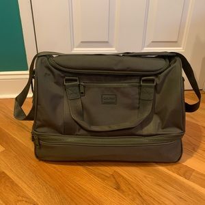 Calpak duffel bag with separated zipper bottom